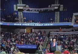  ?? EVAN VUCCI/AP ?? President Donald Trump speaks during a less-than-capacity campaign rally Saturday at the BOK Center in Tulsa, Okla.