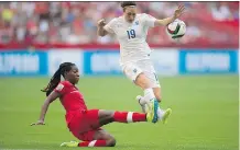  ?? THE CANADIAN PRESS/ FILES ?? Kadeisha Buchanan, left, shows her defensive skills against England’s Jodie Taylor during the FIFA World Cup event. Buchanan is on the shortlist for the world’s top women’s soccer player of the year.