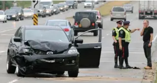  ?? ROBERT WILSON/WATERLOO REGION RECORD ?? Even a minor collision can turn fatal — particular­ly if vehicles are blocking a live traffic lane.