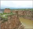  ?? JIANG DONG / CHINA DAILY ?? View of Old Cow Bay on the Yellow River, in Pianguan, with its old tower on the remaining Great Wall section and the Inner Mongolia autonomous region just across the river.