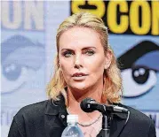  ?? SHOTWELL, INVISION/AP] [PHOTO BY RICHARD ?? Charlize Theron speaks on a panel July 22, day three of Comic-Con Internatio­nal in San Diego.