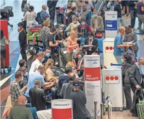 ?? JEROME DELAY/AP ?? A slew of nations moved to stop air travel from southern Africa on Friday in reaction to news of a new, potentiall­y more transmissi­ble COVID-19 variant that was detected in South Africa.