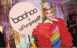  ?? Caroline McCredie Getty Images for Boohoo ?? CHARISMA BELLE attends a Mardi Gras party hosted by apparel retailer Boohoo and buy-now-pay-later app AfterPay in Sydney, Australia, in 2020.