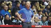 ?? Darryl Oumi Getty Images ?? UCLA COACH Mick Cronin chose to go bald about two years ago when his hair grew in in two colors.