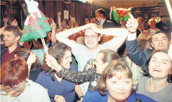  ?? Western Mail Archive ?? > Pro-devolution supporters celebrate the result of the referendum in 1997 – but progress since then has been slow, says Prof Kevin Morgan