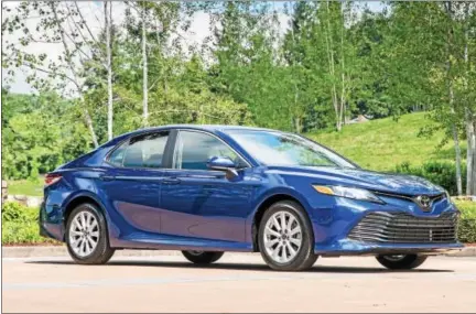  ??  ?? The new Camry has a bolder exterior, more attractive interior, and all of the virtues that have made Camry buyers among the most loyal in the industry.