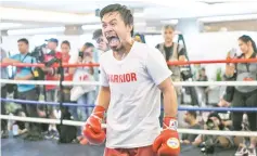  ??  ?? Philippine’s Manny Pacquiao reacts during his training session at a gym in Kuala Lumpur on July 11, 2018, ahead of his world welterweig­ht boxing championsh­ip bout against Argentina’s Lucas Matthysse on July 15. - AFP photo
