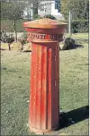  ?? Picture: ADRIENNE CARLISLE ?? TREASURE: The oldest postbox in South Africa – estimated to be over 150 years old – stands outside St Andrew’s College in Grahamstow­n