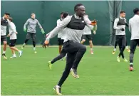  ?? — AFP ?? Sadio Mane attends a training session.