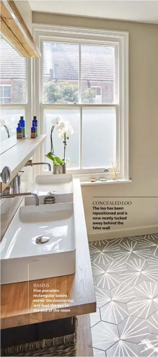  ??  ?? BASINS
Fine porcelain rectangula­r basins mirror the countertop and lead the eye to the end of the room
CONCEALED LOO
The loo has been reposition­ed and is now neatly tucked away behind the false wall