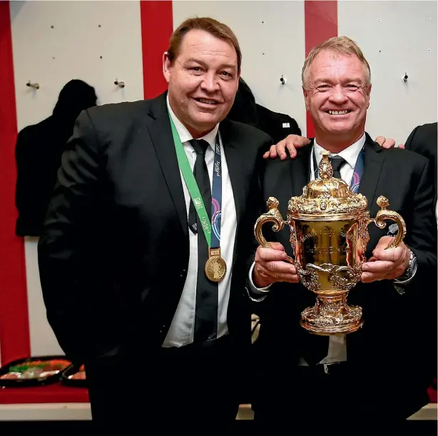  ??  ?? Steve Hansen with Grant Fox and Ian Foster after last year’s World Cup win. Foster is Hansen’s likely successor despite a relatively modest record at the Chie e