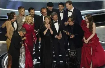  ?? (AP) ?? AWARD. The cast and crew of "CODA" accept the award for best picture at the Oscars on Sunday, March 27, 2022, at the Dolby Theatre in Los Angeles.