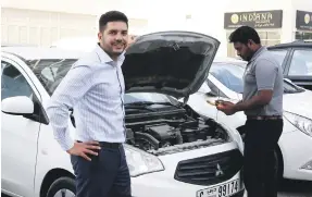  ??  ?? Above, Imad Hammad, founder and chief executive of CarSwitch.com. Left, a car showroom in Abu Dhabi. Psychologi­cal tactics some buyers use in the West do not really work in UAE dealership­s Pawan Singh; Lee Hogland / The National