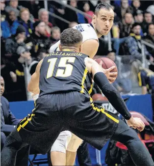  ?? ST. JOHN’S EDGE PHOTO/JEFF PARSONS ?? St. John’s Edge shooting guard Carl English considers his next move while being guarded by Garrett Williamson of the London Lightning during Game 4 of their National Basketball League of Canada divisional semifinal at Mile One Centre. The Edge won...