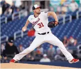  ?? JEFF ROBERSON/ASSOCIATED PRESS ?? Max Scherzer, throwing in late February action for the Washington Nationals, says further pay cuts for the players will be a non-starter in coming negotiatio­ns to restart toward a season.