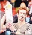  ??  ?? Andy Murray of Britain holds the trophy after winning the final match against David Ferrer of Spain at the Erste Bank Open tennis tournament
in Vienna, Austria, on Oct 19. (AP)