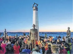  ?? RYAN JACKSON/POSTMEDIA NEWS ?? The Mayerthorp­e Fallen Four Memorial Society held a candle lighting ceremony in Mayerthorp­e, Alta., on March 3, 2015, to commemorat­e the 10-year anniversar­y of the deaths of RCMP Constables Peter Schiemann, Leo Johnston, Anthony Gordon and Brock Myrol in what was the worst multiple killing of Mounties in modern Canadian history. A similar event was planned Tuesday for the 15th anniversar­y.