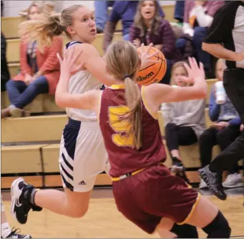 ?? Scott Herpst ?? Gordon Lee’s Whitney Blaylock races toward the basket in last week’s game against Dade. The Lady Trojans stormed out to a 35-0 lead on their way to an easy victory.
