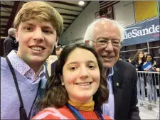  ?? SUBMITTED PHOTO ?? Widener students Jack Heavner and Cloë Di Flumeri snap a selfie with presidenti­al candidate Sen. Bernie Sanders on the campaign trail in New Hampshire.