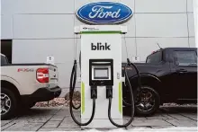 ?? David Zalubowski/associated Press ?? The Biden administra­tion this week is expected to announce new automobile emissions standards that relax proposed limits in the next few years as electric vehicle sales slow.
