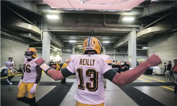  ?? THE CANADIAN PRESS ?? Mike Reilly is in position to surpass the TD and passing yard statistics he put up last year as the CFL’s Most Outstandin­g Player.