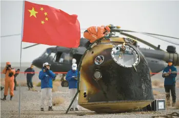  ?? PENG YUAN/XINHUA ?? The return capsule of the Shenzhou-13 manned mission is seen after landing at the Dongfeng site in April in China’s Inner Mongolia Autonomous Region. Strategic rivalry with China’s space program is helping drive NASA’s effort.