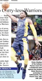  ??  ?? Victor Oladipo of the Indiana Pacers soars for a fastbreak slam against the Golden State Warriors yesterday in Indianapol­is. The Pacers won, 126106. (AP)