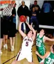  ??  ?? Hayle Sugg breaks free for an inside shot against Greenland. Lincoln lost the senior girls game, 48-30, on Friday.