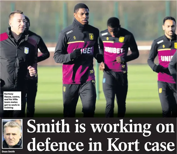  ??  ?? Kortney Hause, centre, and his Villa team-mates get to work in training