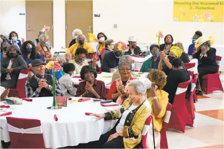  ?? NELVIN C. CEPEDA U-T ?? Community elders are honored at the Fourth District Senior Resource Center in the Skyline Hills of San Diego earlier this month. Money to support the center largely comes from renting out event space on the weekends — which stopped during the pandemic.