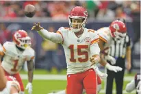  ?? DAVID J. PHILLIP/ASSOCIATED PRESS ?? Chiefs quarterbac­k Patrick Mahomes throws against the Texans during the first half of Sunday’s game in Houston.