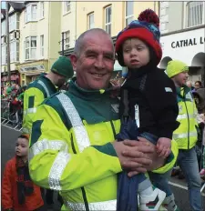  ??  ?? Edward Griffin of the First Responders group marched in the parade with his grandson Harrison.