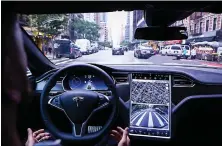  ?? Shuttersto­ck ?? Tesla said that the current features ‘do not make the vehicle autonomous.’