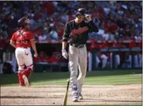  ?? JAE C. HONG — THE ASSOCIATED PRESS ?? The Indians’ Bradley Zimmer walks toward the dugout after striking out during the ninth inning. Zimmer struck out three times in the game.