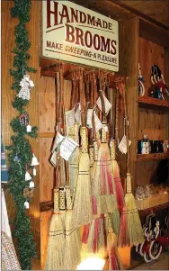  ?? MEGAN DAVIS MCDONALD COUNTY PRESS ?? The Christmas Cottage at Ozark Valley Christmas Tree Farm features a variety of gifts for loved ones including handmade brooms in festive, natural colors; locally crafted wooden toys, unique ornaments, and seasonal candles.