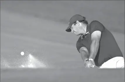  ?? The Associated Press ?? Patrick Reed hits from a bunker onto the 15th green during the Arnold Palmer Invitation­al on Saturday in Orlando, Fla.