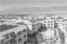  ?? ALLEN J. SCHABEN LOS ANGELES TIMES ?? Solar panels at Dry Creek Villas, a senior housing community in Rancho Cucamonga, produce as much electricit­y as the homes use. Builders hope the state won’t ban gas hookups in new houses until 2026.