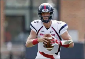  ?? PATRICK SEMANSKY — THE ASSOCIATED PRESS FILE ?? Richmond quarterbac­k and Downingtow­n East product Kyle Lauletta did not hear his name called Friday night, despite being projected by many experts as a third-round prospect. He should hear his name called Saturday.