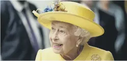  ?? ?? Queen Elizabeth II at Paddington station in
London, to mark the completion of London’s Crossrail project and, no doubt, her lemon yellow outfit is a nod to her new pudding.