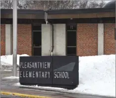  ?? DAVE SCHWARZ/ST. CLOUD TIMES VIA AP ?? A sign marks one of the entrances to Pleasantvi­ew Elementary School on Monday in Sauk Rapids, Minn. Authoritie­s say an 8-year-old student took a kitchen knife to the central Minnesota elementary school and attacked three other children on Monday.