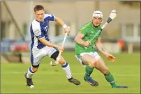  ??  ?? Scotland’s Craig Mainland and Ireland’s Ben Conroy in action.