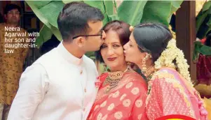  ??  ?? Neera Agarwal with her son and daughter-inlaw