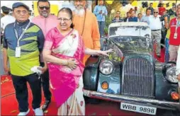  ?? PTI ?? Lok Sabha speaker Sumitra Mahajan examines a vintage car during the opening ceremony of the Constituti­on Club of India Car Rally in New Delhi on Sunday.