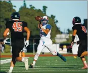  ?? ETHAN SWOPE — SPECIAL TO MARIN INDEPENDEN­T JOURNAL, FILE ?? Tam’s Aidan Newell passes the ball against Redwood in Larkspur in September 2019.