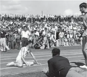  ??  ?? Jim Peters collapses in the marathon at the British Empire Games on Aug. 7, 1954 in Vancouver. — PNG FILES