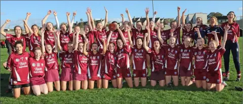  ??  ?? Cheers of joy from the St. Martin’s squad after retaining their title in Bellefield on Saturday.