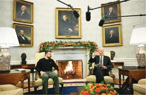  ?? (Mandel Ngan/AFP/Getty Images/TNS) ?? US PRESIDENT Joe Biden with Ukrainian President Volodymyr Zelensky in the Oval Office last year. AI can call into question what’s real and what’s not.