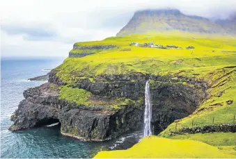  ?? Picture: 123rf.com/kjekol ?? HIGH DRAMA One of the Faroes’ most spectacula­r waterfalls is outside the village of Gasadalur on the west side of Vagar.