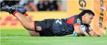  ?? Photo / Photosport ?? Chiefs prop Sione Ahio scores a try on debut against Moana Pasifika.