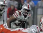  ?? ASSOCIATED PRESS FILE ?? Ohio State linebacker Chris Worley plays during the 2016 Fiesta Bowl. The old guys club at Ohio State is exclusive. All are not only at the top of the Buckeye’s depth chart.